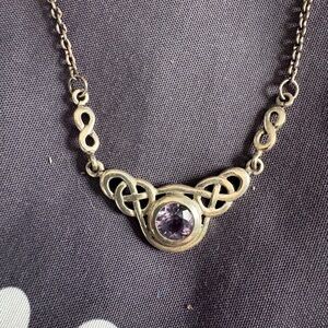 Elegant Silver Necklace with Purple Gemstone